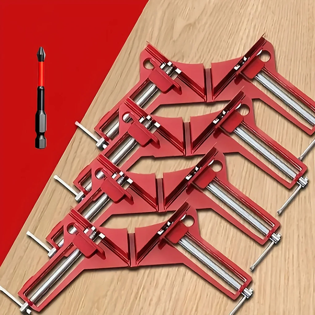 Red clamps on a wooden surface with a red background