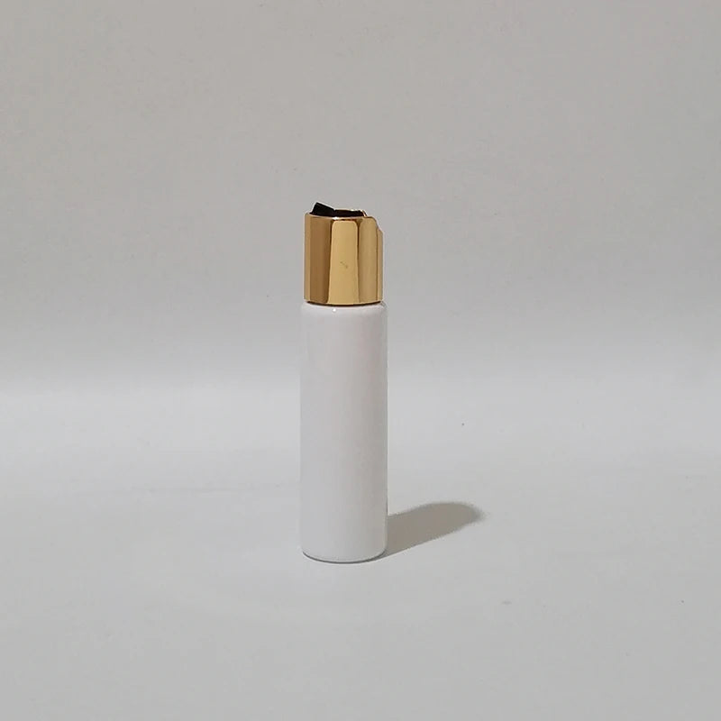 White PET bottle with gold-tone disc-top cap and black insert, white-1