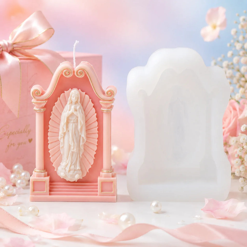 Pink shrine casting with standing Virgin Mary relief beside a white silicone mold