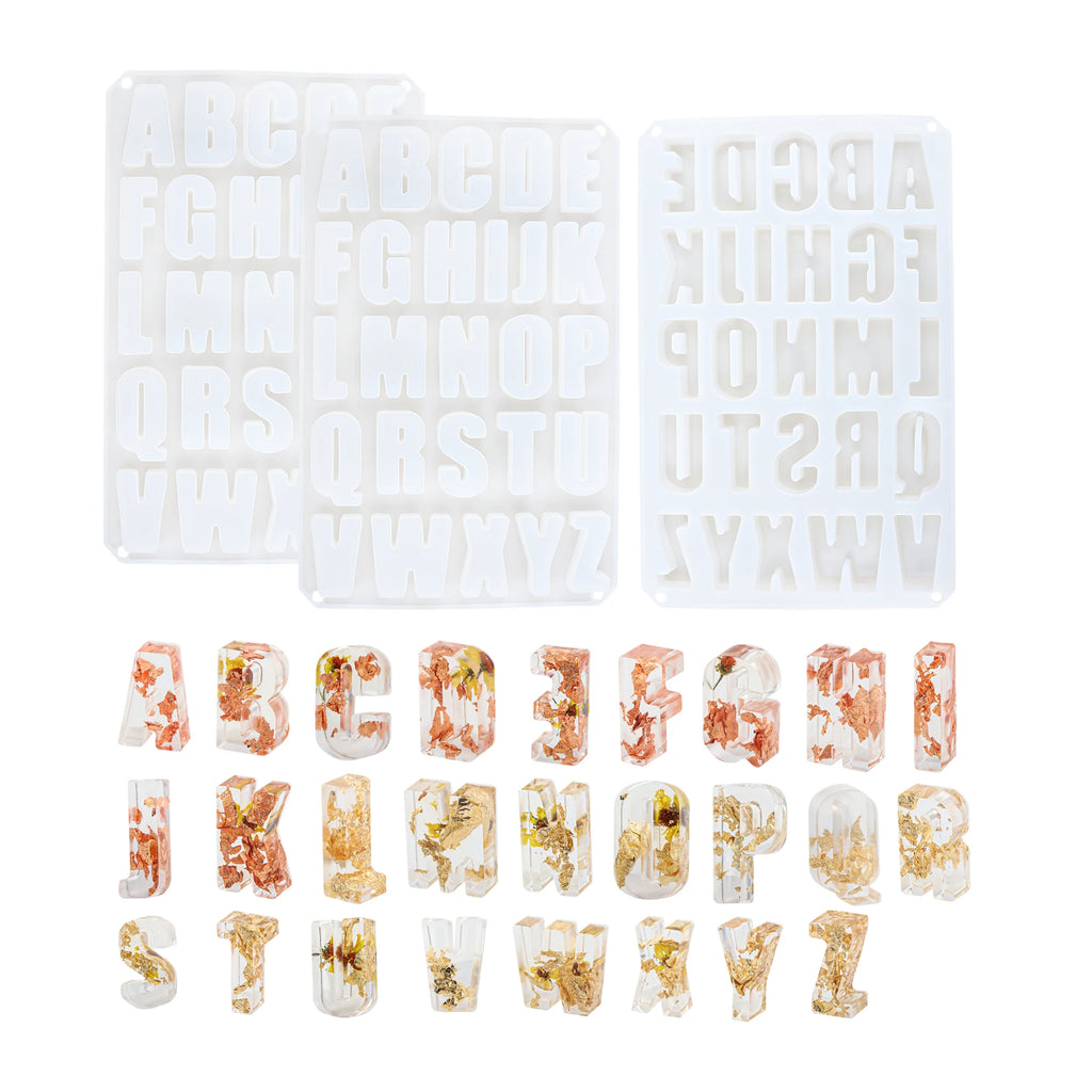 White alphabet silicone molds displayed above 26 clear letter casting examples with floral inclusions