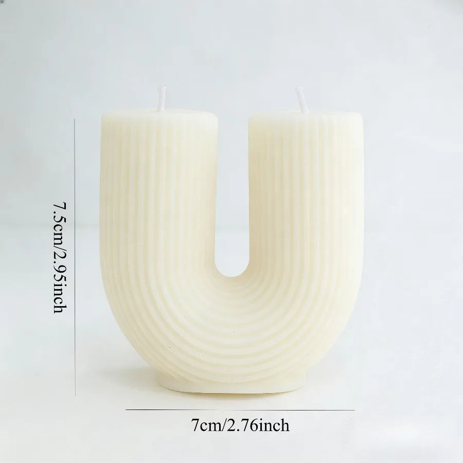 White textured candle with dimensions indicated on a white background