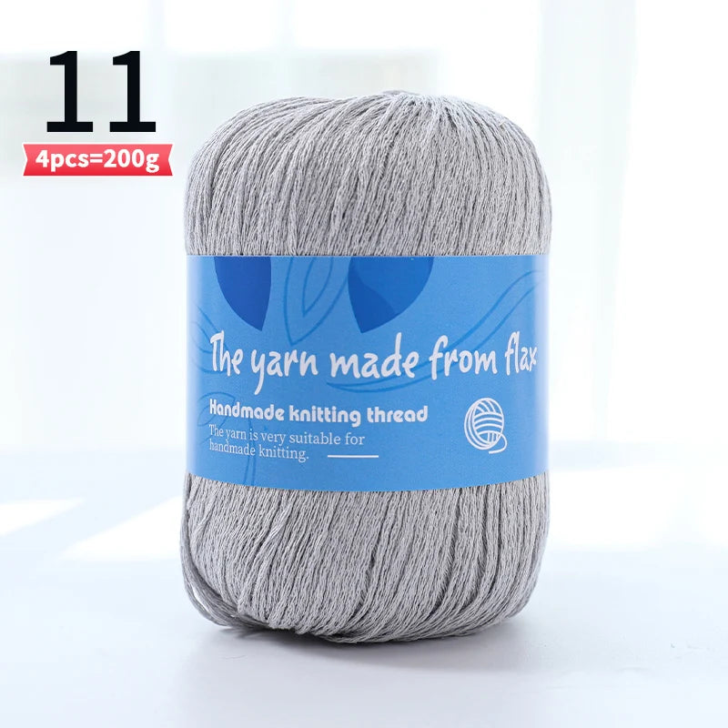 Light gray linen lace yarn skein, color code 11, with a blue flax label.