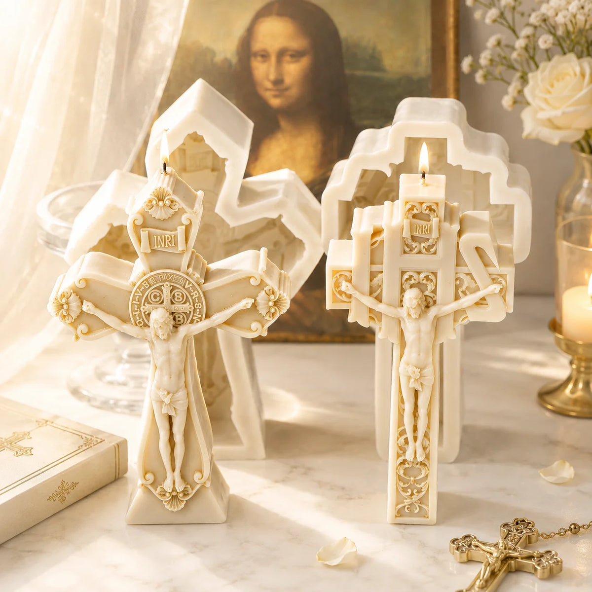 Two lit crucifix example candles displayed in front of their corresponding white silicone molds