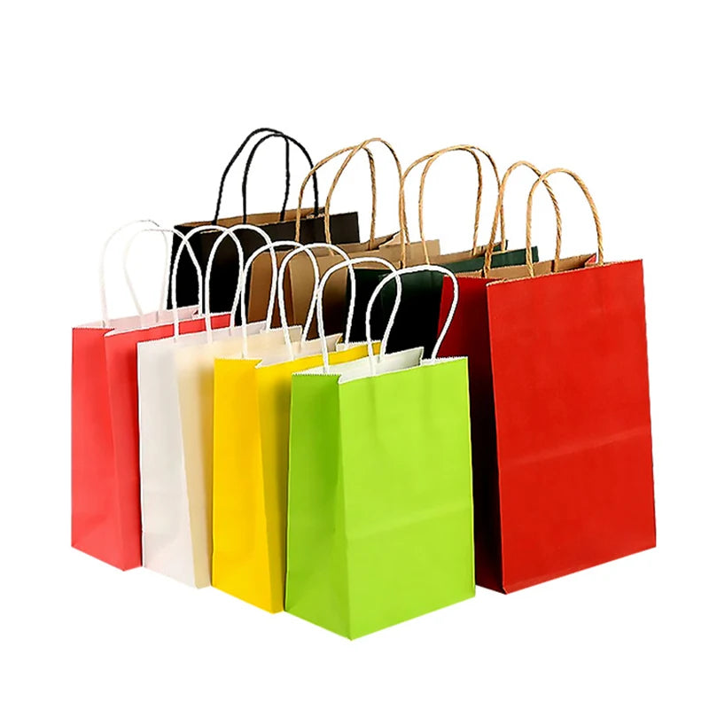 Set of colorful paper gift bags on a white background
