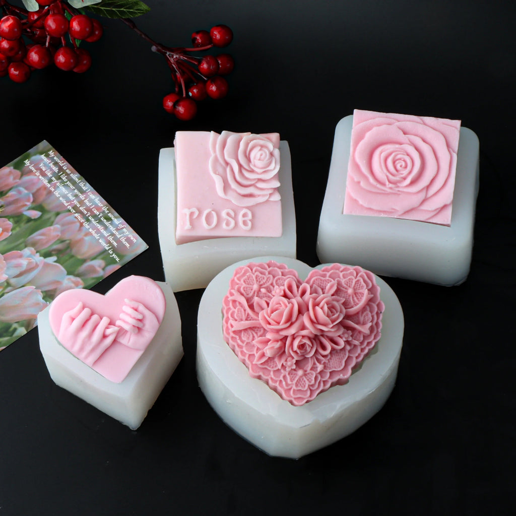 Four silicone molds with floral-heart, pinky-promise and rose-square soap casting examples