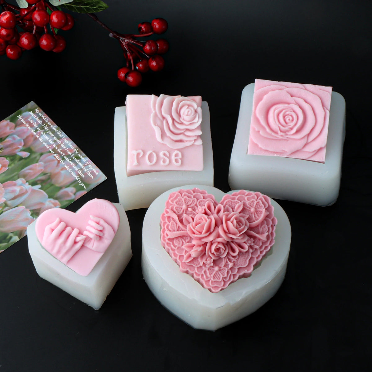 Four silicone molds with floral-heart, pinky-promise and rose-square soap casting examples