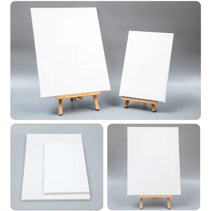 White canvases on wooden easels against a gray background