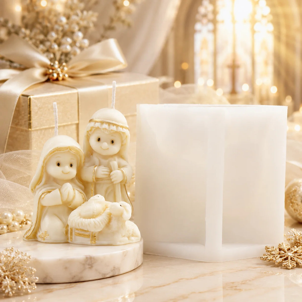 Ivory Nativity casting with standing Joseph, kneeling Mary, baby Jesus and lamb beside a white mold