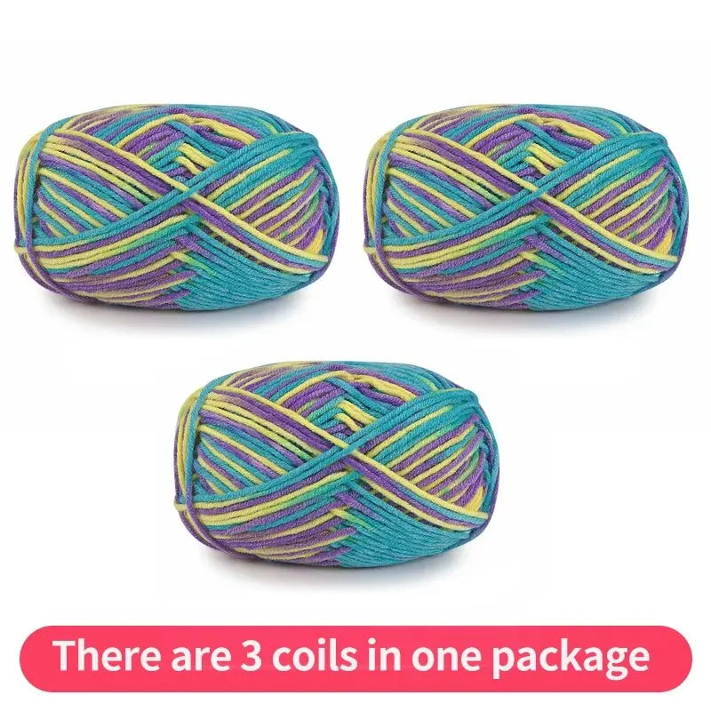 Three variegated yarn skeins in turquoise, purple and yellow, shown as one package.