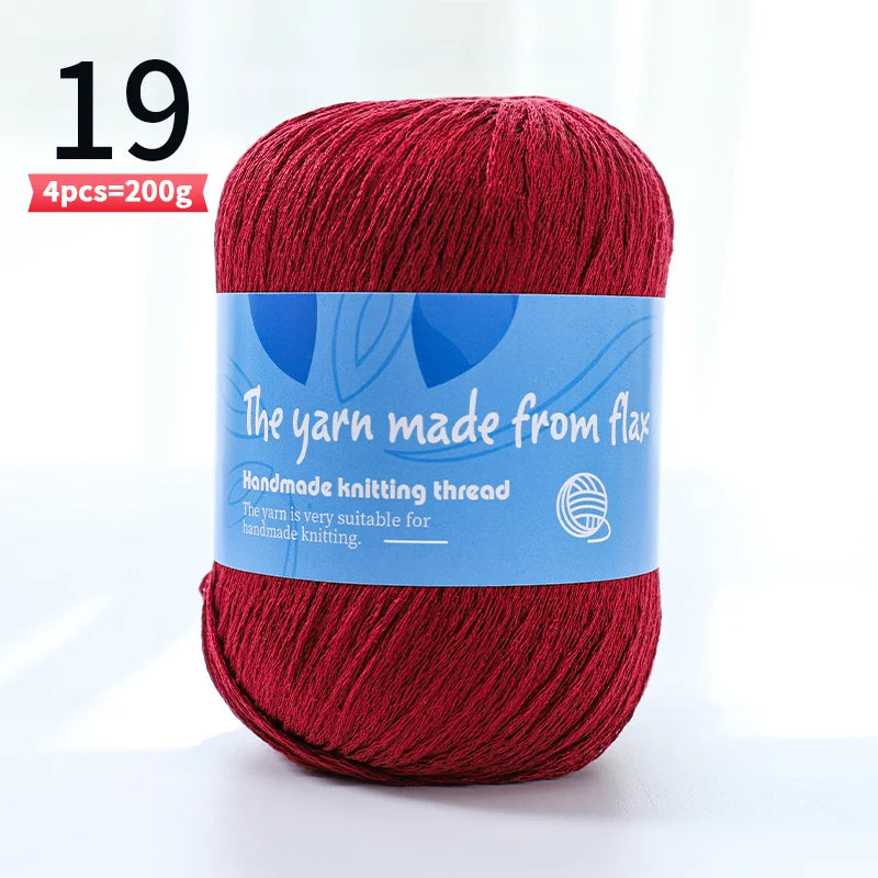 Deep red linen lace yarn skein, color code 19, with a blue flax label.
