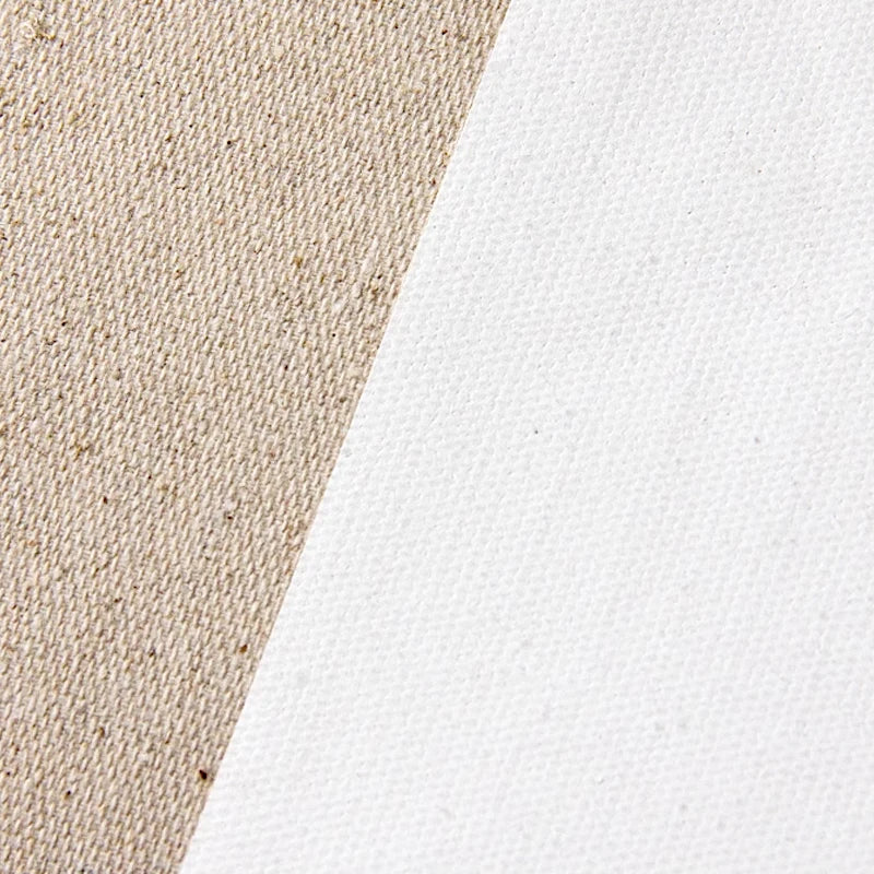 Close-up of a woven canvas texture split diagonally, with a natural beige section on the left and a white section on the right.
