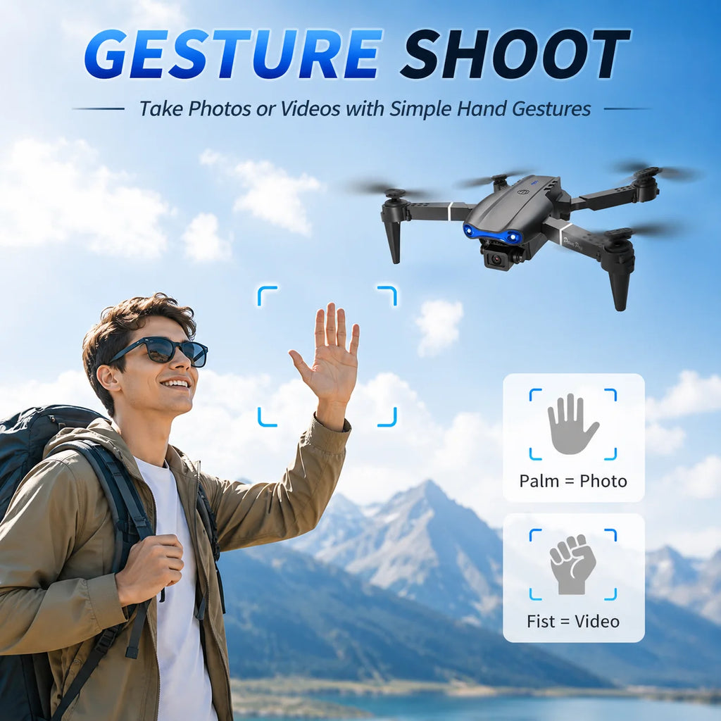 A man in sunglasses and a backpack waves his hand toward a black quadcopter drone flying in the sky, with mountains and water in the background. Large text at the top reads 'GESTURE SHOOT' and smaller text says 'Take Photos or Videos with Simple Hand Gestures.