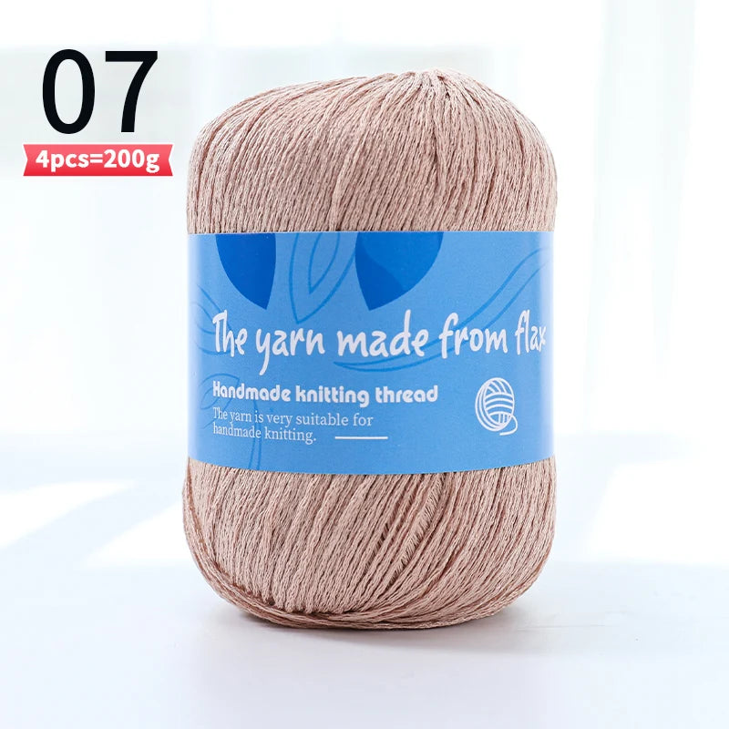 Dusty beige-pink linen lace yarn skein, color code 07, with a blue flax label.