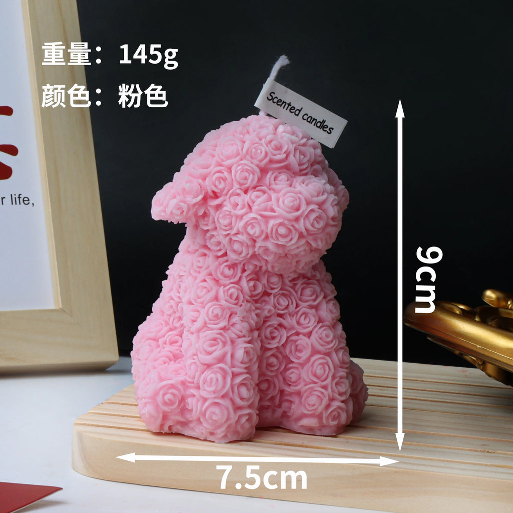 Pink rose-textured seated dog candle with supplier height, width and candle-weight labels