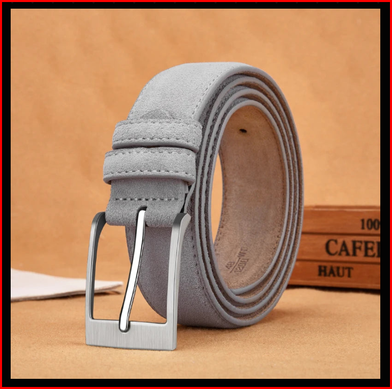 Close-up of a gray suede leather belt with a silver-tone pin buckle